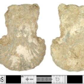 Lead-alloy ampulla dating from the medieval period.