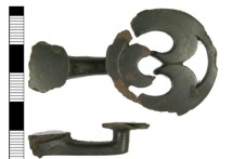 Large cast cu-alloy button and loop fastener dating from the Late Iron Age/ Roman period.