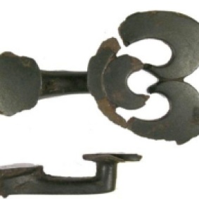 Large cast cu-alloy button and loop fastener dating from the Late Iron Age/ Roman period.